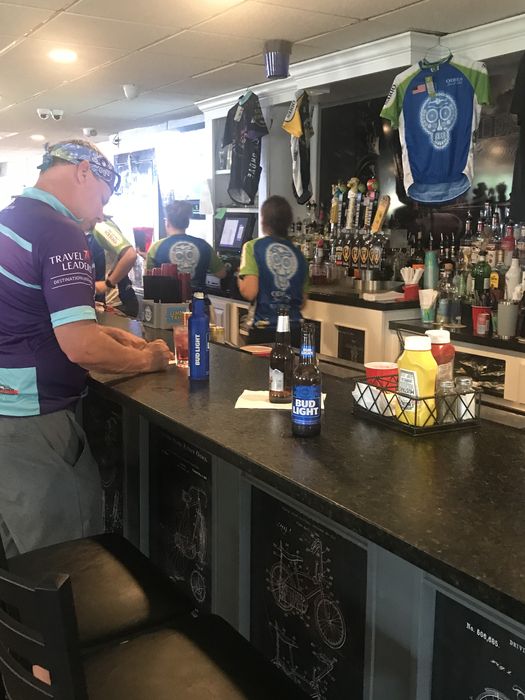 Regulars at the bar, with Odie's cycling jerseys hanging above the taps
